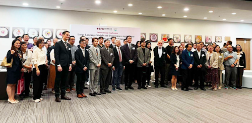 Group photo taken with speakers and guests during the International Conference